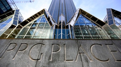 This Monday, April 24, 2017, file photo, shows the office building for PPG Industries at PPG Place in Pittsburgh. PPG Industries Inc. has completed the sale of its fiberglass operations to Nippon Electric Glass Co. The maker of industrial products said Tuesday, Sept. 5, proceeds were about $541 million pretax.