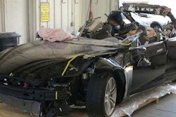 This image provided by the National Transportation Safety Board shows the damage to the left front of the Tesla involved in a May 7, 2016, crash in Williston, Fla. Investigators are meeting Sept. 12, 2017, to determine the likely cause of the crash that killed Joshua Brown, 40, of Canton, Ohio, who was using the semiautonomous driving systems of his Tesla Model S sedan. The sedan struck the underside of a semitrailer that was turning onto a divided highway in Williston. The sedan's roof was sheared off before the vehicle emerged on the other side of the trailer.