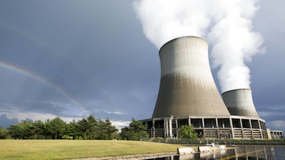 In this Aug. 28, 2017 photo, a double rainbow can be seen next to the twin cooling towers at the Byron Generating Station in Byron, Ill. The Byron Generating Station held it annual open house Aug. 28, during which visitors had a chance to see the control room simulator, maintenance training shops, and emergency preparedness stations among other exhibits. About 500 people signed up to tour the Byron Generating Station's training center.