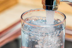Water plant operator came under scrutiny when schools closed and pregnant women were warned not to drink tap water.