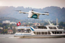 In this image made available from Matternet Thursday Sept. 28, 2017, a Matternet drone is pictured transporting on-demand e-commerce goods in Zurich, Switzerland. Drones will soon start to deliver small items in Zurich as part of a pilot project, the first of its kind over a populated area, transporting goods about 8 to 16 kilometers (5 to 10 miles) to awaiting delivery vans and the van drivers will then deliver them to customers.