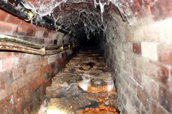 A Fatberg covers an 1852-built sewer at Westminster in in London, Monday, Sept. 25, 2017. British engineers are studying ways to dispose of yet another oversize “fatberg” threatening London’s sewers. Stuart White of Thames Water says the latest fat blob is located in a busy area beneath Chinatown near London’s famed Leicester Square.
