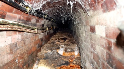 A Fatberg covers an 1852-built sewer at Westminster in in London, Monday, Sept. 25, 2017. British engineers are studying ways to dispose of yet another oversize “fatberg” threatening London’s sewers. Stuart White of Thames Water says the latest fat blob is located in a busy area beneath Chinatown near London’s famed Leicester Square.