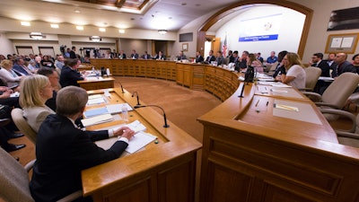 In this Aug. 3, 2017 photo, the Wisconsin Assembly Committee on Jobs and Economy meets about the incentive deal for Taiwan-based Foxconn Technology Group, at the state Capitol in Madison, Wis. The Legislature may change state law to expedite court appeals involving the proposed plant to be built by Foxconn. The budget-writing committee was to vote on a proposal Tuesday, Sept. 5, 2017, that would require the state Supreme Court to hear any appeals of circuit court rulings involving Foxconn.