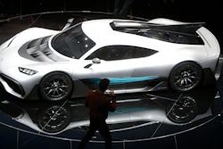 Formula One driver Lewis Hamilton films the Mercedes-AMG Project One hyper after the world premiere during an event of German carmaker Mercedes-Benz on the eve of the opening of the International Frankfurt Motor Show IAA in Frankfurt, Germany, Monday, Sept. 11, 2017, which runs through Sept. 24, 2017.