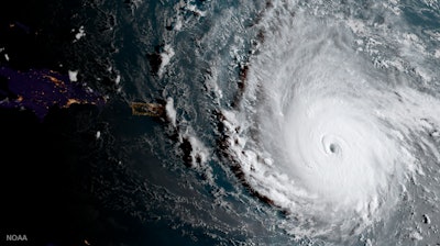 In this geocolor image captured by GOES-16 and released by the National Oceanic and Atmospheric Administration (NOAA), Hurricane Irma, a potentially catastrophic category 5 hurricane, moves westward, Tuesday morning, Sept. 5, 2017.