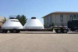 The two halves of a mock Orion spacecraft arrive at Kansas State University's Ice Hall in August. After the capsule frame arrived at the Manhattan campus, the kinesiology research team -- including graduate and undergraduate students -- finished the construction.