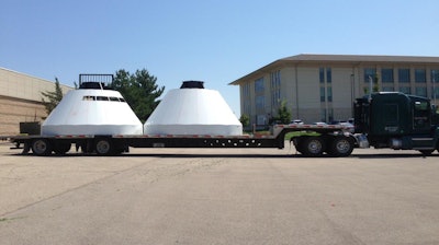 The two halves of a mock Orion spacecraft arrive at Kansas State University's Ice Hall in August. After the capsule frame arrived at the Manhattan campus, the kinesiology research team -- including graduate and undergraduate students -- finished the construction.