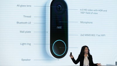 Michelle Turner, general manager of security products for Nest Labs, talks about the Hello doorbell during an event Wednesday, Sept. 20, 2017, in San Francisco. Home device maker Nest Labs is adding Google's facial recognition technology to a camera-equipped doorbell and rolling out a security system in an attempt to end its history of losses. The products announced Wednesday expand upon the internet-connected thermostats, smoke detectors and stand-alone security cameras that Nest has been selling since its inception six years ago.