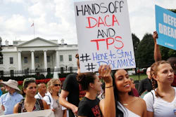 Yurexi Quinones, 24, of Manassas, Va., a college student who is studying social work and a recipient of Deferred Action for Childhood Arrivals, known as DACA, rallies next to Ana Rice, 18, of Manassas, Va., far right, in support of DACA, outside of the White House in Washington, Tuesday, Sept. 5, 2017. President Donald Trump plans to end a program that has protected hundreds of thousands of young immigrants brought into the country illegally as children and call for Congress to find a legislative solution.