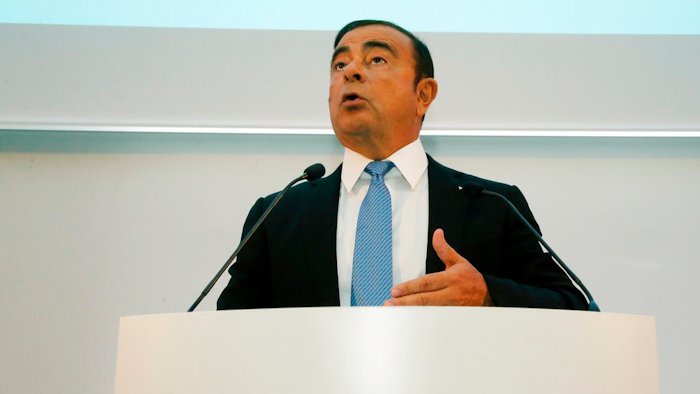 Renault Group CEO Carlos Ghosn speaks during a media conference at La Defense business district, outside Paris, France, Friday, Oct. 6, 2017. French carmaker Renault says half of its models will be electric or hybrid by 2022 and it's investing heavily in 'robo-vehicles' with increasing degrees of autonomy.