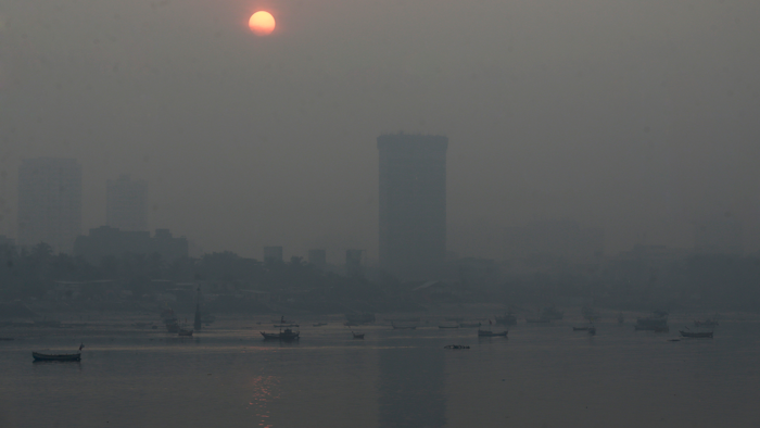 Morning smog envelops the skyline in Mumbai, India, Friday, Oct. 20, 2017. Environmental pollutants are killing at least 9 million people and costing the world $4.6 trillion a year, a toll exceeding that of wars, smoking, hunger or natural disasters. One out of every six premature deaths in the world in 2015, about 9 million, could be attributed to disease from toxic exposure.