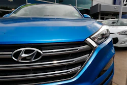In this Friday, Oct. 6, 2017, photo, a 2017 Santa Fe sports utility vehicle sits outside a Hyundai dealership in the south Denver suburb of Littleton, Colo. Battered by dramatically falling sales for the past five years, Hyundai is training its dealers to make the car-buying experience easier for consumers.