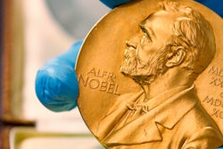 A national library employee shows the gold Nobel Prize medal awarded to the late novelist Gabriel Garcia Marquez.