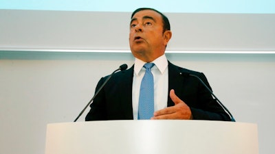 Renault Group CEO Carlos Ghosn speaks during a media conference at La Defense business district, outside Paris, France, Friday, Oct. 6, 2017. French carmaker Renault says half of its models will be electric or hybrid by 2022 and it's investing heavily in 'robo-vehicles' with increasing degrees of autonomy.