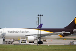 In this Tuesday, April 18, 2017 photo, a United Parcel Service cargo plane sits idle during the day as it awaits loading at Richmond International Airport in Sandston, Va.. UPS says in court records that it suspects one of its pilots obtained secret business plans for the shipping giant's aircraft fleet and posted them online. In a federal lawsuit filed the week of Oct. 6, 2017, UPS says its strategic plans are highly confidential, and says a PowerPoint presentation was intended only for senior executives.