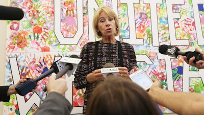 Education secretary Betsy DeVos addresses reporters during her visit to McMinnville High School in McMinnville, Ore., Wednesday, Oct. 11, 2017.