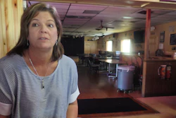 Tammy Graceffa, 51, owner of the Hiawatha Bar and Grill, talks in her restaurant on Wednesday, Oct. 4, 2017 in Sturtevant, Wis., about Foxconn's announcement of the location of its planned manufacturing plant in nearby Mount Pleasant. Graceffa owns land in the development site and said the news was bittersweet because she stands to benefit economically but she might lose the land where she grew up.