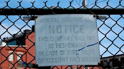 A sign posted outside of the old GE plant.