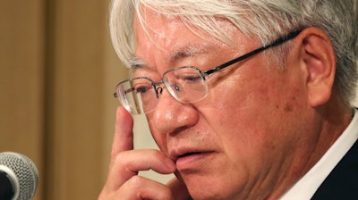 In this Oct. 13, 2017 file photo, Kobe Steel President and CEO Hiroya Kawasaki reacts as he listens a questions during a press conference in Tokyo. Japanese automakers have confirmed use of Kobe Steel products affected by fake inspection data, but say they have found no safety concerns so far.