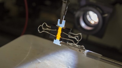 A close-up of a sample solar photovoltaic cell being tested in the NanoEnergy Lab at Worcester Polytechnic Institute (WPI). The lab is developing new materials that could replace silicon, potentially lowering the cost of making solar cells while improving their efficiency.