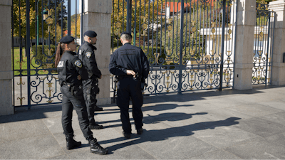 Police stand in front of the residence of Ivica Todoric, founder of the Croatia's biggest private company, in Zagreb, Monday, Oct. 16, 2017. Croatian police on Monday raided the homes of Todoric and his former aides amid an ongoing investigation over the retail giant's financial collapse.