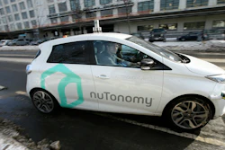 In this Tuesday, Jan. 10, 2017, file photo, an autonomous vehicle is driven by an engineer on a street in an industrial park in Boston. A new study inspired by Boston’s early experiments with self-driving cars finds that the technology could ease congestion, but also lead to more cars on the road and further encourage urban sprawl.