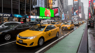 In this Thursday, May 25, 2017, file photo, traffic makes its way down Seventh Avenue in New York's Times Square. Cruise Automation, a self-driving software company owned by General Motors, will start testing in New York in early 2018. They’ll have an engineer behind the wheel to monitor performance. Cruise CEO Kyle Vogt says the densely populated city will give the company more unusual situations to test software. Cruise currently is testing in San Francisco.