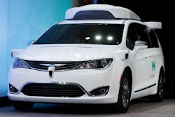 In this Sunday, Jan. 8, 2017, file photo, a Chrysler Pacifica hybrid outfitted with Waymo's suite of sensors and radar is shown at the North American International Auto Show in Detroit. Waymo is testing vehicles on public roads with only an employee in the back seat. The testing started Oct. 19 with an automated Chrysler Pacifica minivan in the Phoenix suburb of Chandler, Ariz. It’s a major step toward vehicles driving themselves without human backups on public roads.