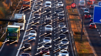 Cars and trucks queue on the highway A5 in Frankfurt, Germany, Monday, Nov. 6, 2017. The World Climate Conference with 25 000 people participating starts on Monday in Bonn, Germany.
