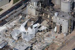 In this June 1, 2017 file photo, part of the Didion Milling Plant lies in ruins following a May 31, 2017, explosion in Cambria, Wis. Federal labor officials say the Wisconsin milling company should pay $1.8 million in fines for failing to prevent the fatal explosion. The Occupational Safety and Health Administration issued a news release Friday, Nov. 17, saying that an accumulation of highly combustible grain dust likely caused the explosion. OSHA officials said the explosion was preventable.
