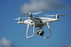 In this Oct. 16, 2017 photo, the Streetsboro police department's first drone flies in Streetsboro, Ohio,. Streetsboro Police purchased a drone this year and trained their first drone pilot officer in October, becoming one of hundreds of agencies across the country adopting the technology. They say they can't afford a helicopter, but a drone provides many of the same capabilities at a fraction of the price.