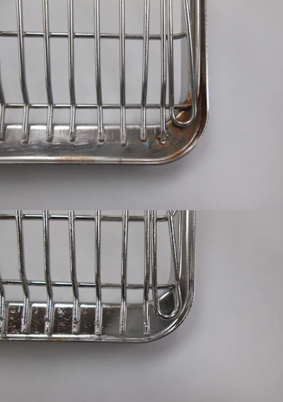 Before (top) and after (bottom) photos of a rack that has been electropolished.