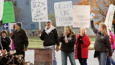 Workers at manufacturer Fairbank Scales picket after contract negotiations failed, Thursday, Nov. 2, 2017 in St. Johnsbury, Vt.
