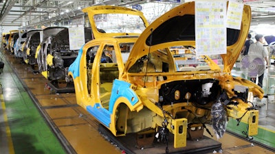 In this July 13, 2012, file photo, assembly lines sit idle at the Hyundai Motor factory in Ulsan, South Korea. Hyundai Motor Co. union spokesman Hong Jae-gwan said Tuesday, Nov. 28, 2017, that about 1,950 workers, or 4 percent of its union members, stopped work Monday at a plant in Ulsan, 380 kilometers (236 miles) southeast of Seoul. He said there was no plan to expand the partial strike into a full-blown one.