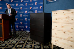 In this Tuesday, June 28, 2016, file photo, with two Ikea dressers displayed at right, Consumer Product Safety Commission (CPSC) Chairman Elliot Kaye speaks during a news conference at the National Press Club in Washington. Ikea is relaunching a recall of 29 million chests and dressers after the death of a seventh child attributed to one of the dressers tipping over. Ikea CEO Lars Petersson said the company wants to increase awareness of the recall campaign, first announced in June 2016, for several types of chest and dressers that can easily tip over if not properly anchored to a wall.