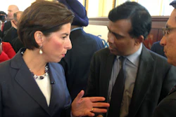 Rhode Island Gov. Gina Raimondo, left, and Infosys President Ravi Kumar, center, speak after a news conference, Monday, Nov. 27, 2017, in Providence, R.I., announcing the India-based information technology outsourcing firm will open a design and innovation hub in the state and plans to add 500 jobs there in the next five years.