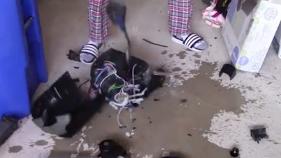 A Keurig machine is smashed.