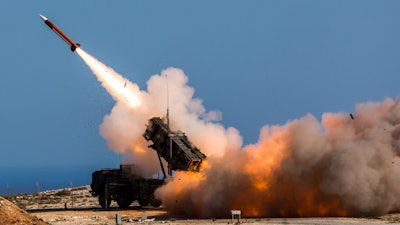 In this Wednesday, Nov. 8, 2017 released by the U.S. Department of Defense, German soldiers assigned to Surface Air and Missile Defense Wing 1, fire the Patriot weapons system at the NATO Missile Firing Installation, in Chania, Greece. U.S. defense giant Lockheed Martin says the company is delivering its Patriot anti-missile system to Saudi Arabia and that the kingdom is on track to become the second international customer, after the United Arab Emirates, to acquire its THAAD system.