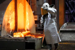 The Jan. 28, 2008 file picture shows a worker walking in the new furnace at the ThyssenKrupp steel factory in Duisburg, Germany. A new facility scheduled to open in April 2018 will cut down 10 million tons of CO2 emissions a year.