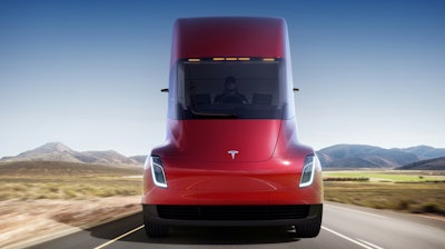 This photo provided by Tesla shows the front of the new electric semitractor-trailer unveiled on Thursday, Nov. 16, 2017. The move fits with Tesla CEO Elon Musk's stated goal for the company of accelerating the shift to sustainable transportation.