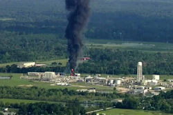 In this Sept. 1, 2017, file photo, smoke rises from the Arkema Inc. owned chemical plant in Crosby, near Houston, Texas. Federal investigators say they've seen no signs that the Houston-area plant that flooded and partially exploded during Hurricane Harvey considered moving its highly unstable compounds offsite as a precaution.