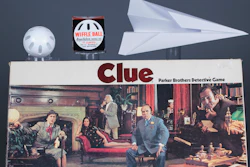 This undated photo provided by The Strong shows the three toys inducted into the National Toy Hall of Fame Class of 2017, from top left, the Wiffle Ball, the paper airplane and the board game Clue. The trio was honored at the upstate New York hall on Thursday, Nov. 9, 2017.