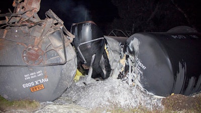 This photo made available by Polk County Fire Rescue shows molten sulfur that spilled from a derailed train near Lakeland, Fla., Monday, Nov. 27, 2017. State officials are investigating the crash.