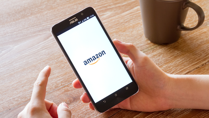 Man Hand Holding Screen Shot Of Amazon Application 588359470 2125x1416