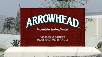 In this July, 7, 2004, file photo, a sign at the entrance to the Arrowhead Mountain Spring Water Company bottling plant, owned by Swiss conglomerate Nestle, on the Morongo Indian Reservation near Cabazon, Calif. Nestle, which sells Arrowhead bottled water, may have to stop taking millions of gallons of water from Southern California's San Bernardino National Forest because state regulators concluded it lacks valid permits. The State Water Resources Control Board notified the company on Wednesday, Dec. 20, 2017, that an investigation concluded it doesn't have proper rights to pipe about three-quarters of the water it currently withdraws for bottling.