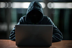 Hacker In Front Of His Computer 583818378 2142x1404