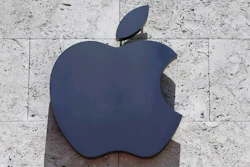 This Tuesday, Aug. 8, 2017, file photo shows the Apple logo at a store in Miami Beach, Fla. Apple is investing $390 million in Finisar, a company that makes the lasers used in facial recognition. The investment announced Wednesday, Dec. 13, is the latest from Apple’s $1 billion Advanced Manufacturing Fund, dedicated to investments in U.S. manufacturers and creating jobs in the U.S.