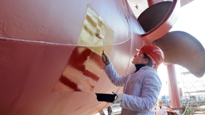 The new coating has already been successfully tested on ships like the 'African Forest', which travels from Belgium to Gabon in central Africa. Technical biologist from Kiel University, Dr Martina Baum, applied the test coating herself.