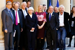 Microsoft co-founder Bill Gates, left, Sir Richard Branson, right, and special envoy to the U.N. for climate change Michael Bloomberg, second right, arrive for a meeting of philanthropists funding climate projects as part of the Climate Summit, at the Elysee Palace, in Paris, Tuesday, Dec. 12, 2017. More than 50 world leaders are gathering in Paris for a summit that Macron hopes will give new momentum to the fight against global warming, despite U.S. President Donald Trump's rejection of the Paris climate accord.